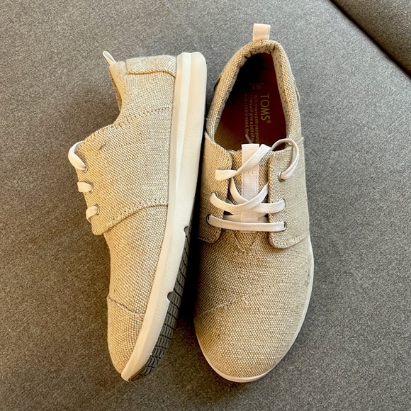 Toms Shoes Cream Colored Toms Tennis Shoes With Shimmer Poshmark